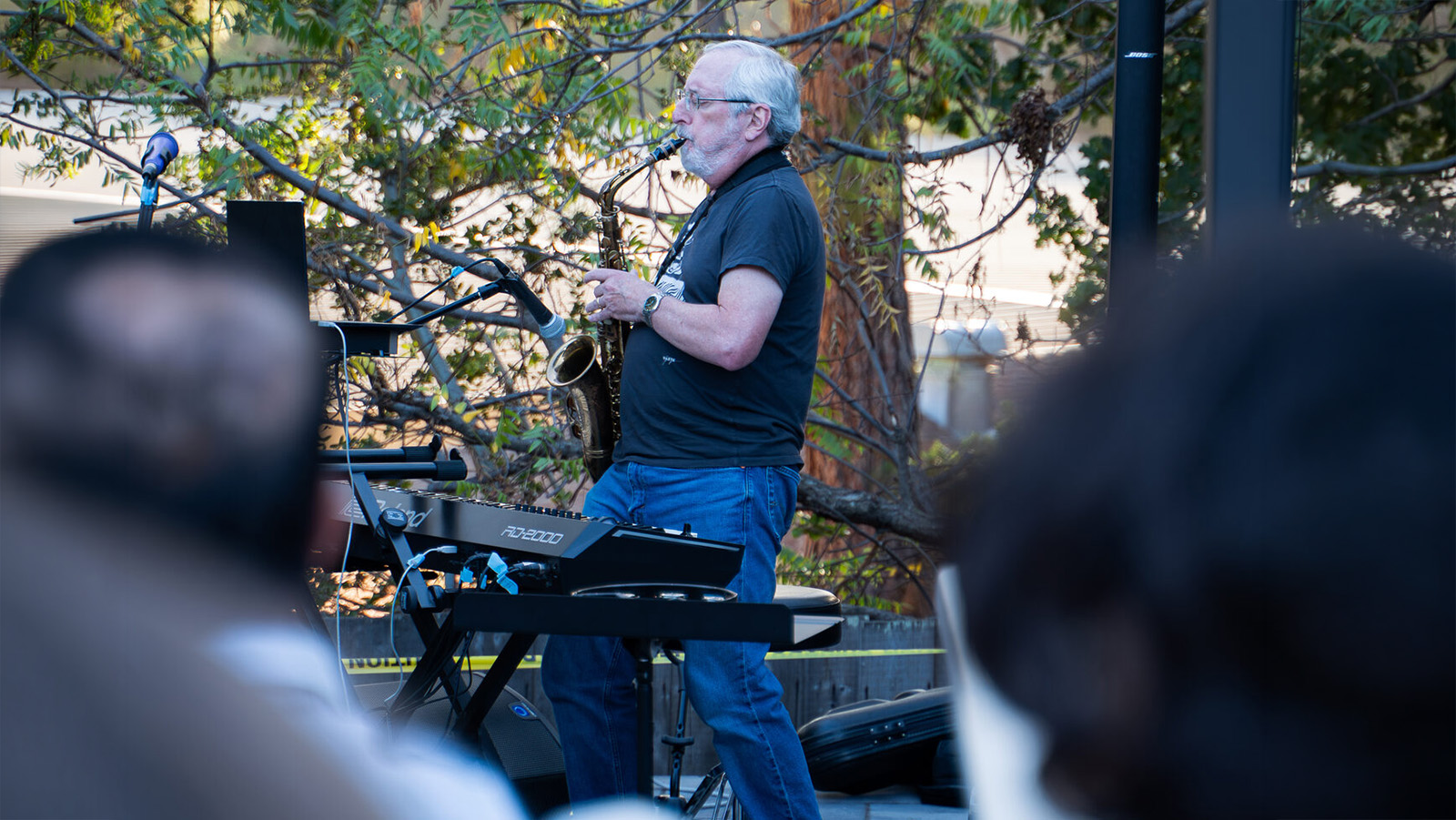 Ken performing on saxophone